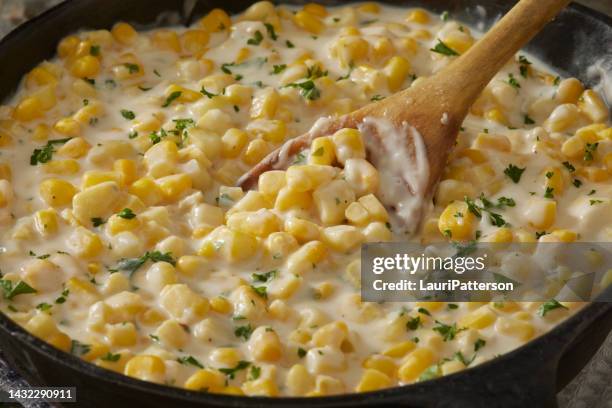 fresh home made skillet creamed corn - wooden spoon stock pictures, royalty-free photos & images