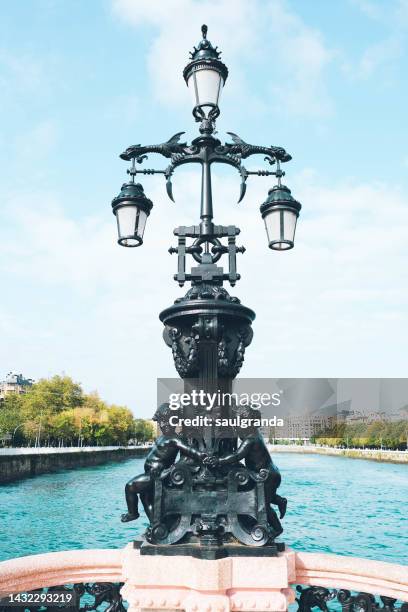lamppost on the maria cristina bridge - são sebastião espanha imagens e fotografias de stock