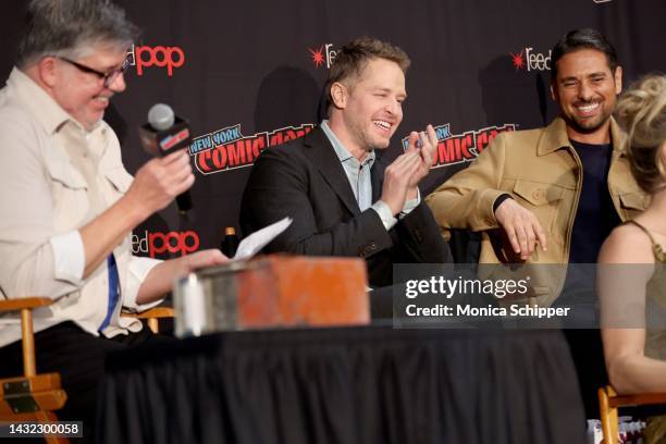 Jim Halterman, Josh Dallas, and JR Ramirez speak onstage during a panel with Netflix's Manifest at New York Comic Con on October 08, 2022 in New York...