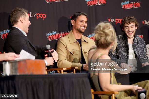 Josh Dallas, JR Ramirez, Melissa Roxburgh and Ty Doran speak onstage during a panel with Netflix's Manifest at New York Comic Con on October 08, 2022...