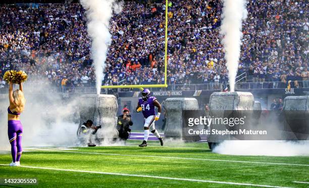 Dalvin Tomlinson of the Minnesota Vikings takes the field during player introductions before the game against the Chicago Bears at U.S. Bank Stadium...