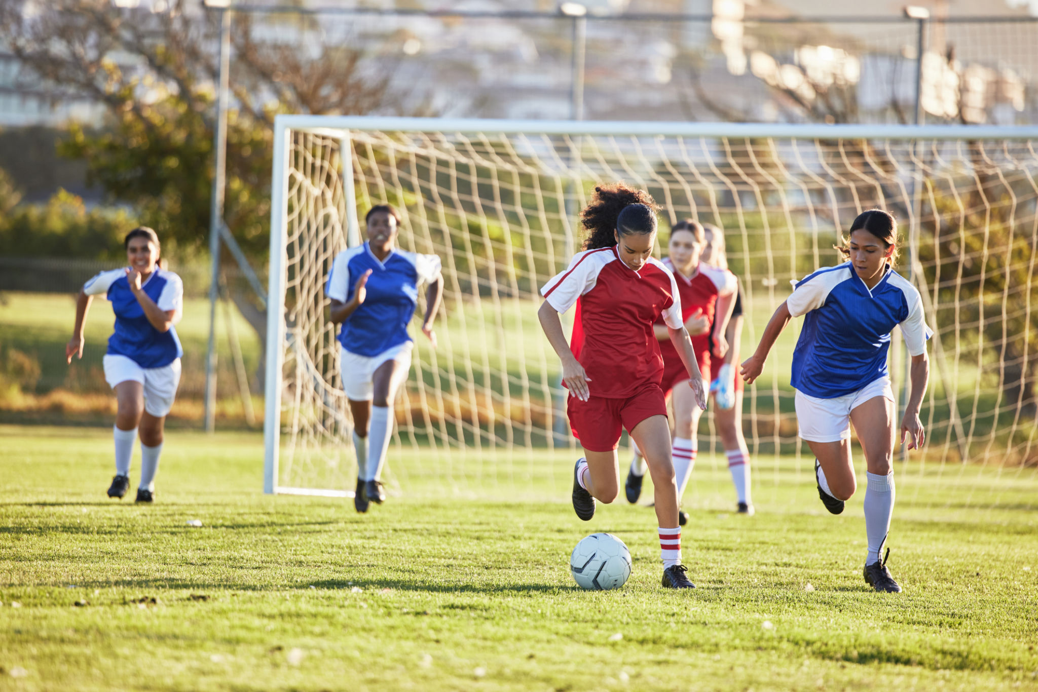 child playing soccer