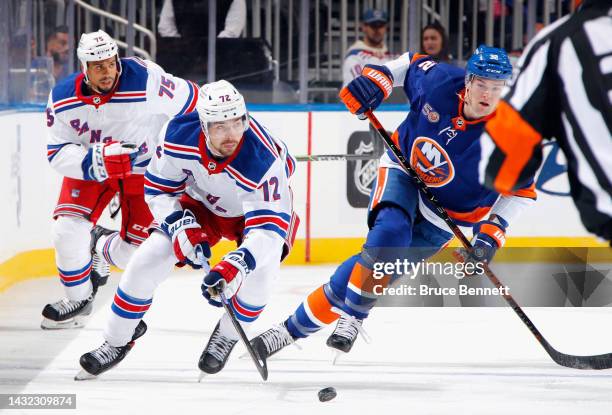 Filip Chytil of the New York Rangers skates against the New York Islanders at the UBS Arena on October 08, 2022 in Elmont, New York.