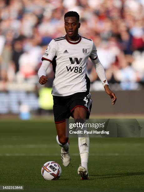 Tosin Adarabioyo of Fulham runs with the ball during the Premier League match between West Ham United and Fulham FC at London Stadium on October 09,...