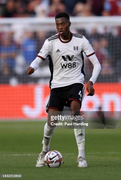 Tosin Adarabioyo of Fulham runs with the ball during the Premier League match between West Ham United and Fulham FC at London Stadium on October 09,...