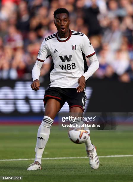 Tosin Adarabioyo of Fulham runs with the ball during the Premier League match between West Ham United and Fulham FC at London Stadium on October 09,...