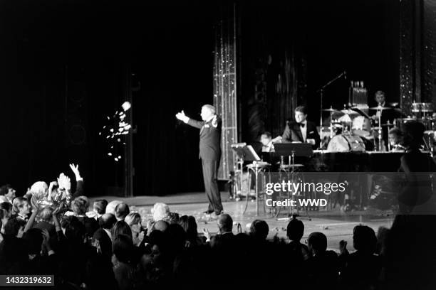 Frank Sinatra performs during a benefit event at the Moulin Rouge in the Quartier Pigalle neighborhood of Paris, France, on September 27, 1984.