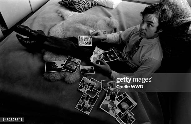 Jamie Auchincloss answers questions during an interview in his apartment.