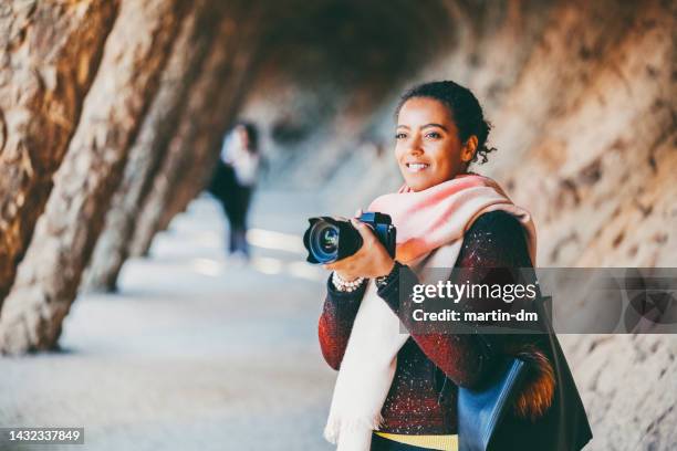 mixed race traveler exploring europe with camera - travel photographer stock pictures, royalty-free photos & images