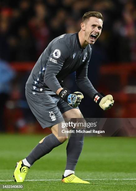 Dean Henderson of Nottingham Forest celebrates their side's first goal scored by Emmanuel Dennis of Nottingham Forest during the Premier League match...