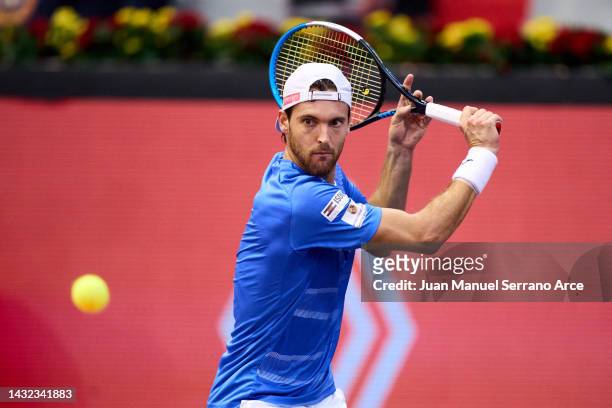 Joao Sousa of Portugal plays a backhand in his first round singles match against Dominic Thiem of Austria during day one of the Gijon Open ATP 250 at...