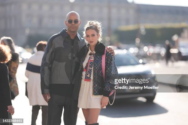 Emili Sindlev and Mads Emil Grove Moller seen wearing total Louis Vuitton looks, outside Louis Vuitton during Paris Fashion Week on October 04, 2022...