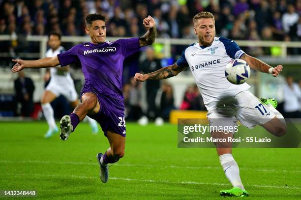 Ciro Immobileof SS Lazio compete for the ball with Lucas Martinez Quarta of ACF Fiorentina during the Serie A match between ACF Fiorentina and SS...