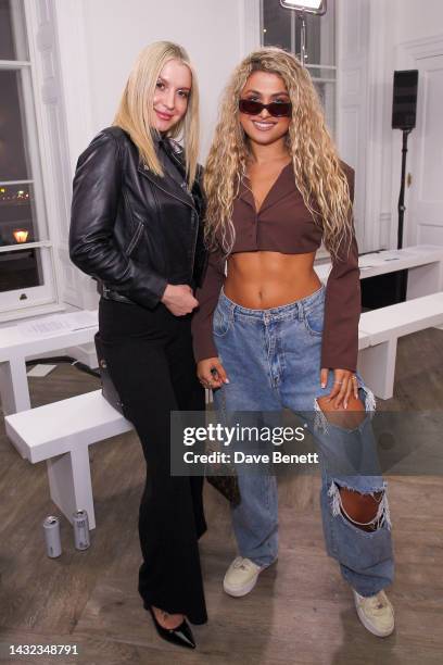 Victoria Brown and Antigoni Buxton attend the JCA x Patrick McDowell x MA show and party on October 10, 2022 in London, England.