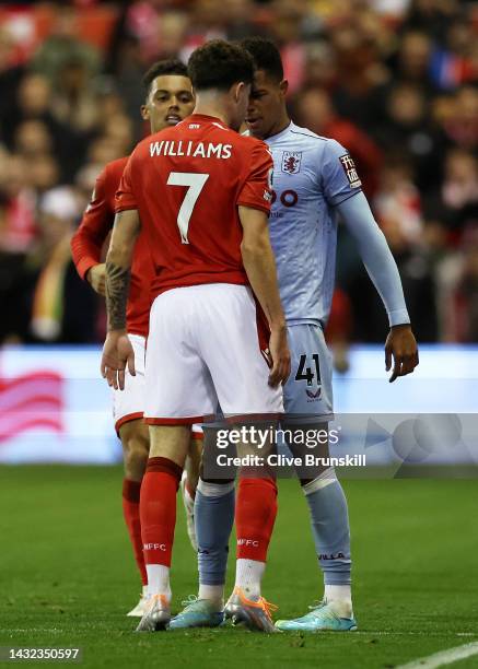 Neco Williams of Nottingham Forest clashes with Jacob Ramsey of Aston Villa during the Premier League match between Nottingham Forest and Aston Villa...