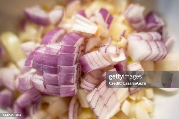 chopped onions, ingredients for homemade tortilla - cutting red onion stock pictures, royalty-free photos & images