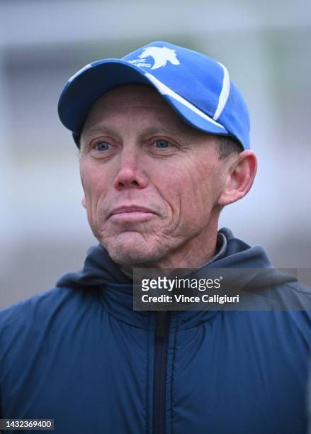 Trainer Chris Munce is seen during a trackwork session ahead of the Caulfield Cup at Caulfield Racecourse on October 11, 2022 in Melbourne, Australia.