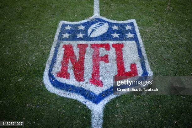 General view of an NFL logo on the field during the game between the Washington Commanders and the Tennessee Titans at FedExField on October 9, 2022...