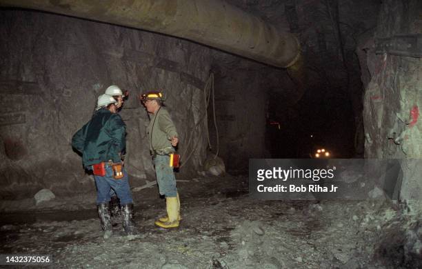 Mine workers have a conversation 1500-feet underground at Newmont Gold Company Deep Star Mine, June 5, 1997 in Elko, Nevada.