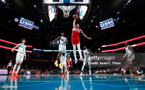 Kyle Kuzma of the Washington Wizards dunks the ball during the third quarter of the game against the Charlotte Hornets at Spectrum Center on October...