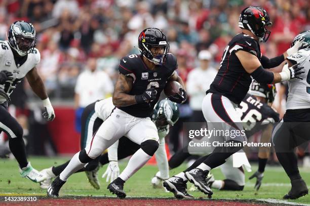 Running back James Conner of the Arizona Cardinals rushes the football against the Philadelphia Eagles during the NFL game at State Farm Stadium on...