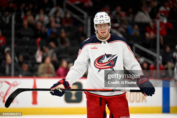 Patrik Laine of the Columbus Blue Jackets rests during a break against the Washington Capitals during a preseason game at Capital One Arena on...