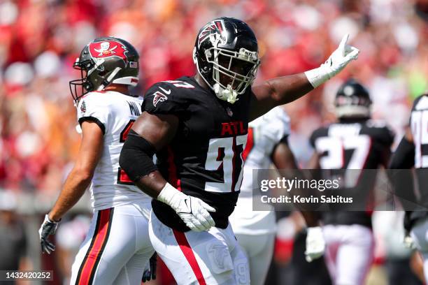 Grady Jarrett of the Atlanta Falcons celebrates after a play during an NFL football game against the Tampa Bay Buccaneers at Raymond James Stadium on...