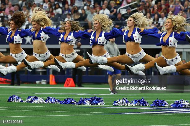 The Dallas Cowboys Cheerleaders perform during the game against the Washington Commanders at AT&T Stadium on October 02, 2022 in Arlington, Texas.