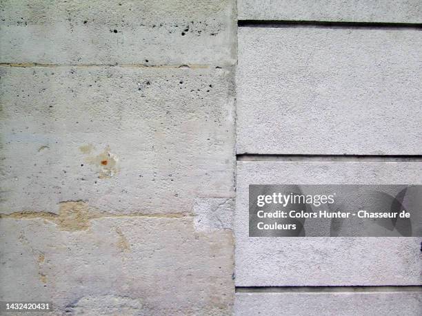 close-up view of an old and new freestone wall in paris, france - newly industrialized country stock pictures, royalty-free photos & images