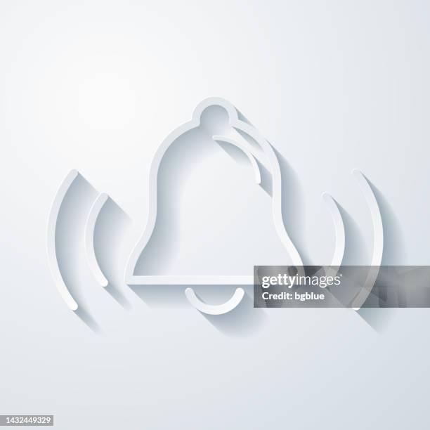 ringing bell. icon with paper cut effect on blank background - alarm system stock illustrations