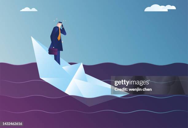 business man trapped in a sinking boat - paper boat stock illustrations