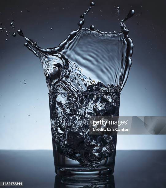 Water Splash In Glass High-Res Stock Photo