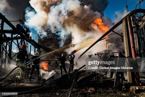 Firefighters work to put out a fire at CHP power station hit by Russian missile on October 10, 2022 in Kyiv, Ukraine. The aerial threat in the...