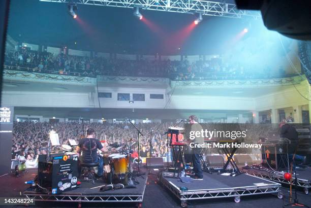 Sebastian Beresford, Neil Barnes and Adam Wren of Leftfield performs on stage at Brixton Academy on April 21, 2012 in London, United Kingdom.