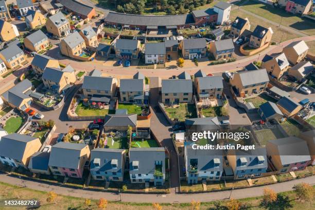 drone view of a new housing development - suburban housing development stock pictures, royalty-free photos & images