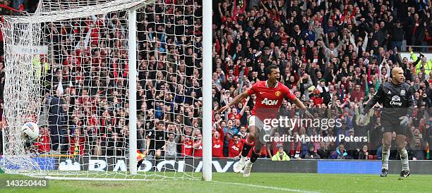 Nani of Manchester United celebrates scoring their third goal during the Barclays Premier League match between Manchester United and Everton at Old...