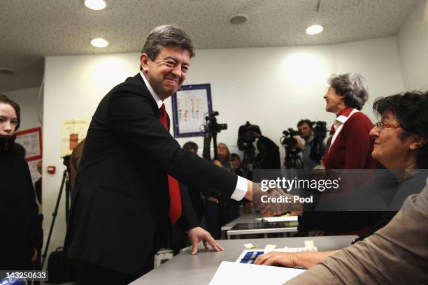 Front de Gauche candidate Jean-Luc Melenchon votes during the first round of the 2012 French Presidential election on April 22, 2012 in Paris,...