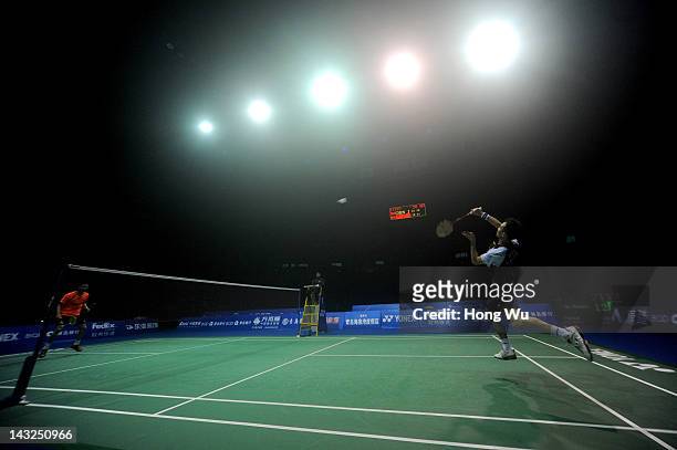 Du Pengyu of China in action against Chen Jin of China during their men's singles final match during day six of the 2012 Badminton Asia Championships...