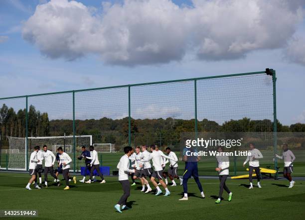 The Tottenham Hotspur team take part in a training session ahead of their UEFA Champions League group D match against Eintracht Frankfurt at...