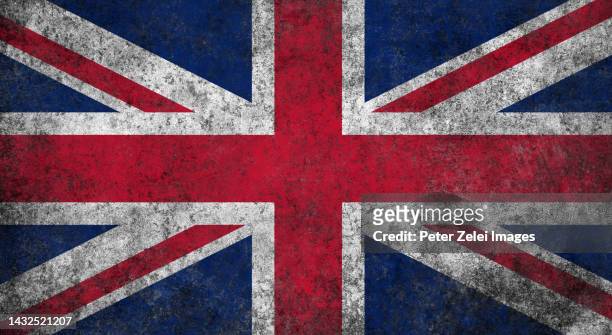 grunge british flag - old uk flag stockfoto's en -beelden