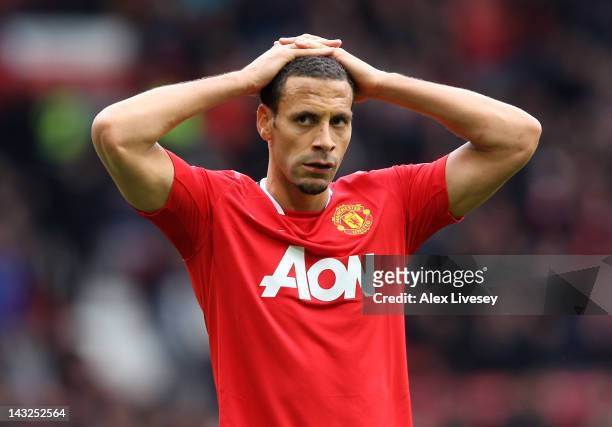 Rio Ferdinand of Manchester United looks dejected at the end of the Barclays Premier League match between Manchester United and Everton at Old...
