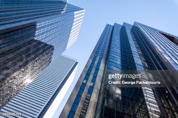 low angle view of skyscrapers in the financial district of toronto, canada - building skyscraper foto e immagini stock