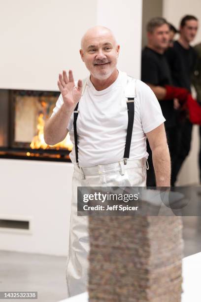 Damien Hirst takes part in the burning of artworks at Newport Street Gallery on October 11, 2022 in London, England. In July 2021, a collection of...