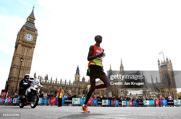 Wilson Kipsang of Kenya passes Westminster during the Virgin London Marathon 2012 on April 22, 2012 in London, England.