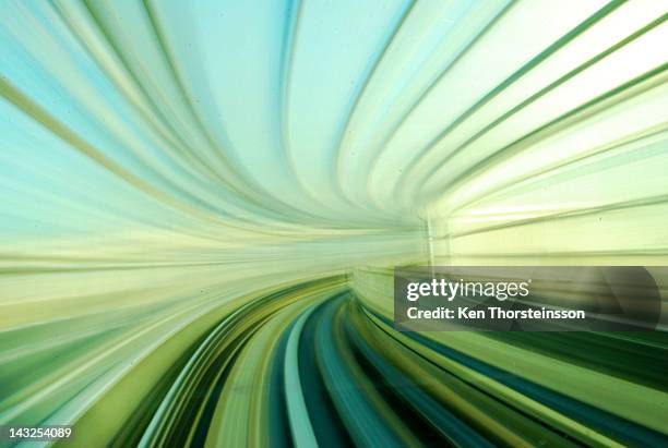 warp speed in train tunnel - distorted image stock-fotos und bilder