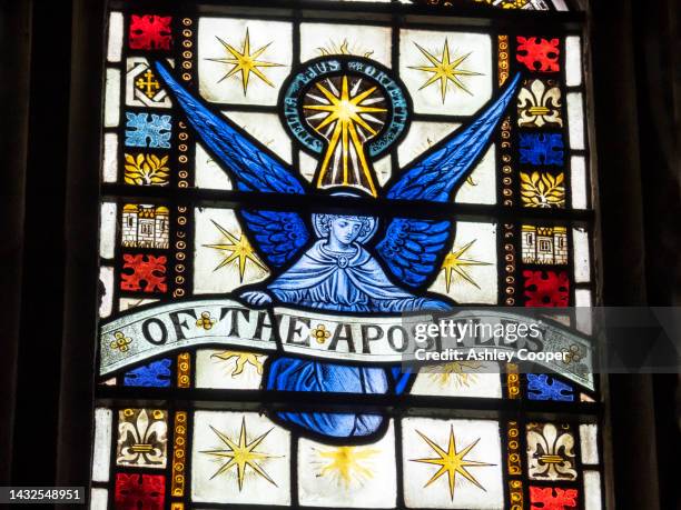 stained glass in downham church near clitheroe, lancashire, uk. - stained glass angel stock pictures, royalty-free photos & images