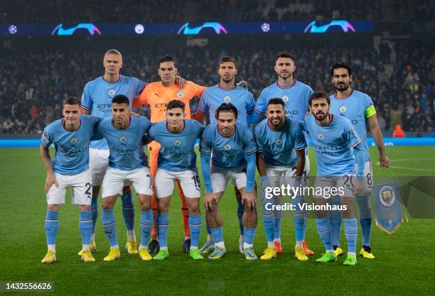 The Manchester City team group, back row l-r, Erling Haaland, Ederson, Ruben Dias, Aymeric Laporte and Ilkay Gundogan, front row l-r, Sergio Gomez,...