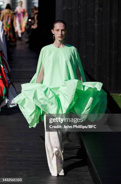 Model walks the runway at the Roksanda show during London Fashion Week September 2022 on October 11, 2022 in London, England.