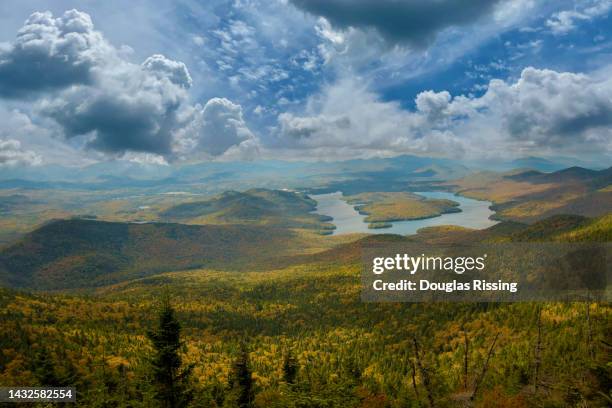 lake placid in autumn in new york - lake placid stock pictures, royalty-free photos & images