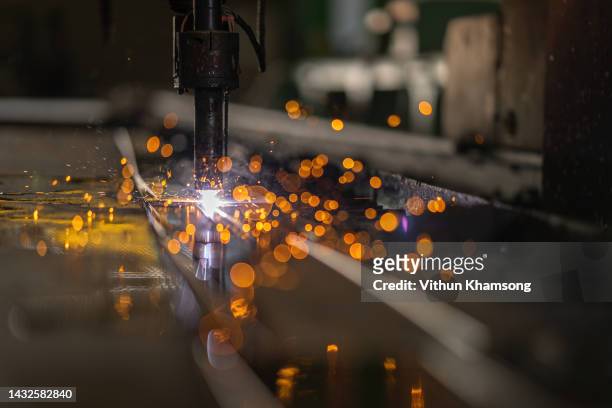 computer numerical control for cutting and weld steel structure at industrial manufacturer. - laser cutting stock pictures, royalty-free photos & images